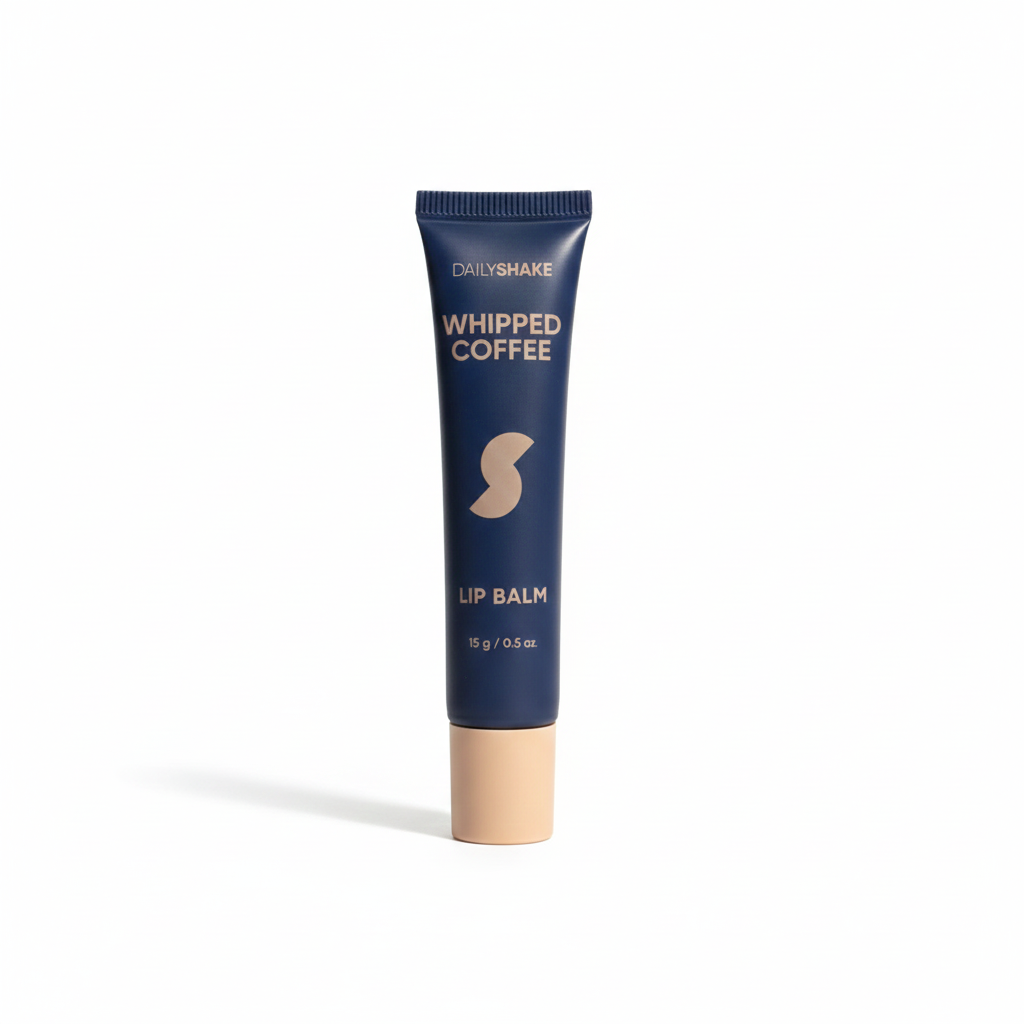Lip balm tube labeled 'Whipped Coffee' by DailyShake on a white background
